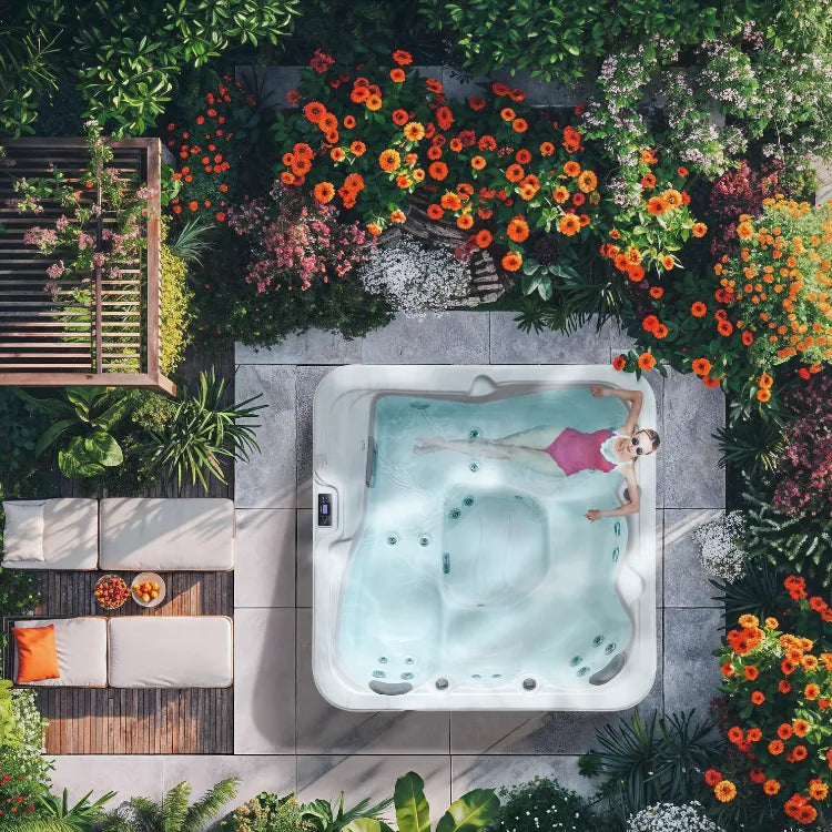 Woman in a pink swimming costume relaxing in a luxurious spa