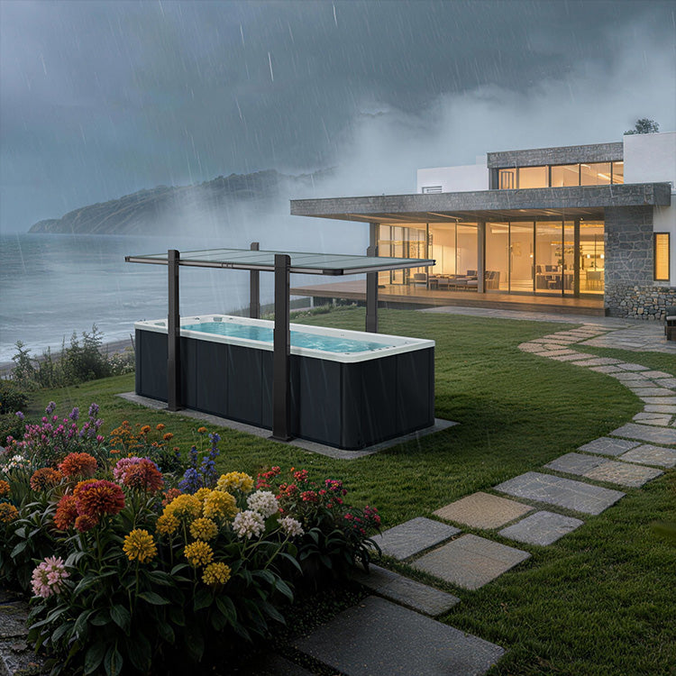 Modern house with a hot tub on a rainy day by the ocean
