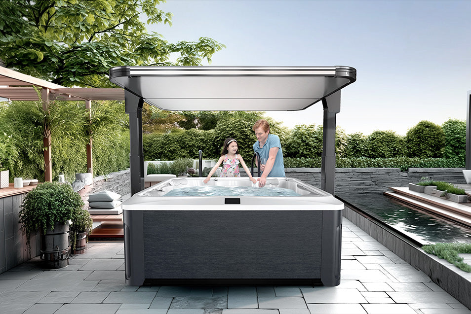 Hot tub with cover in a garden