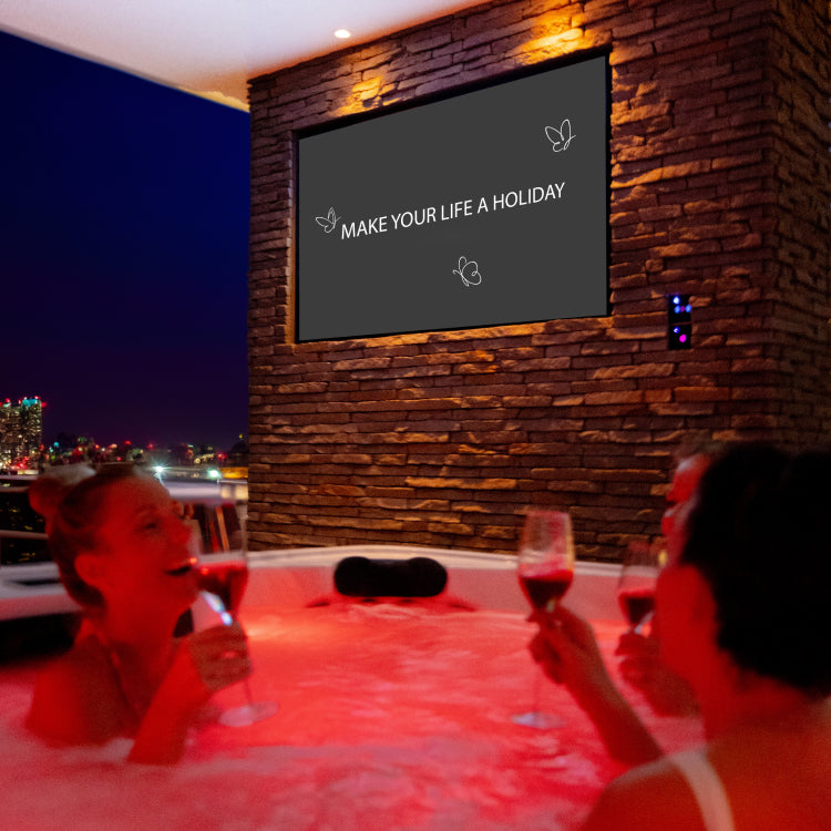Women drinking wine in the evening in the hot tub.