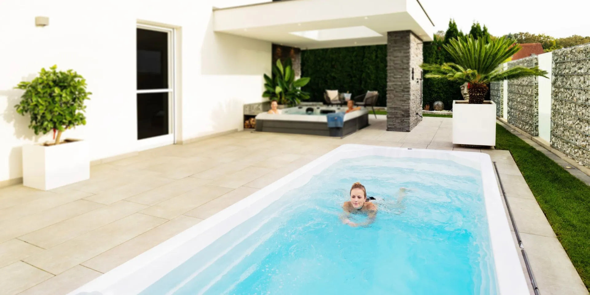 Person swimming in an exercise pool