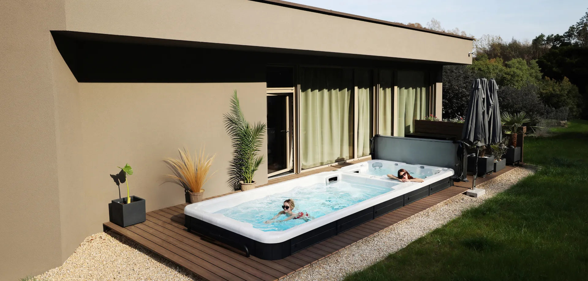 women in the outdoor swim spa