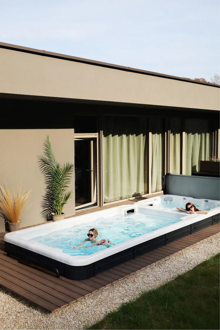 women in the outdoor swim spa